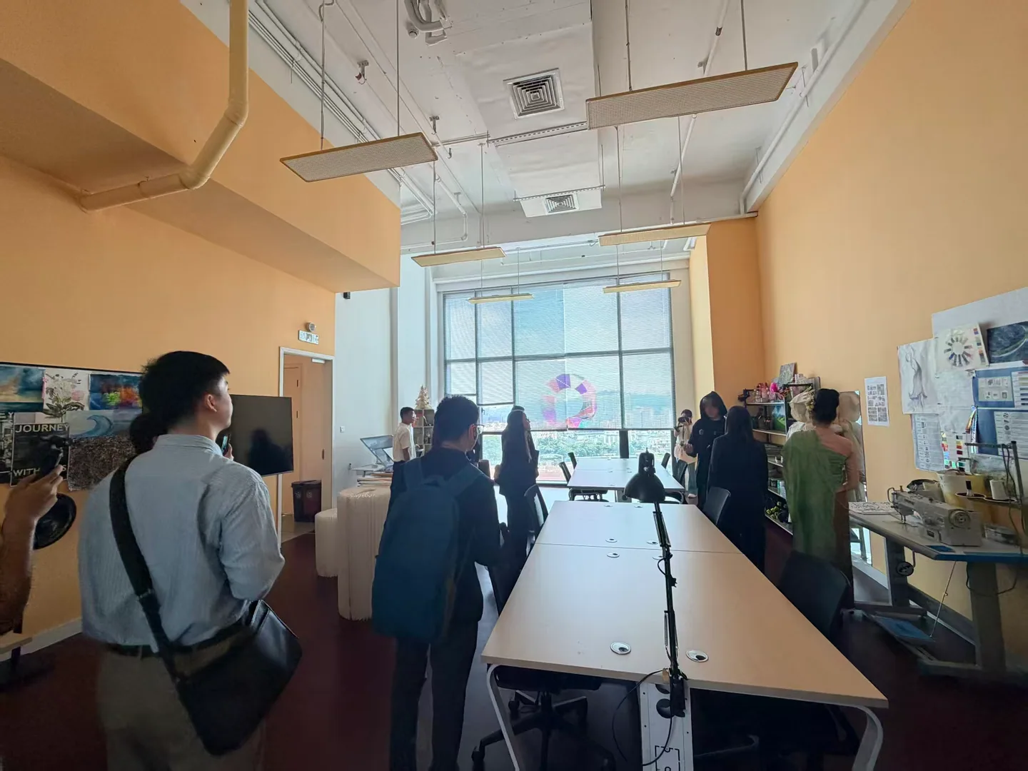 Participants visiting a creative studio and its workspaces